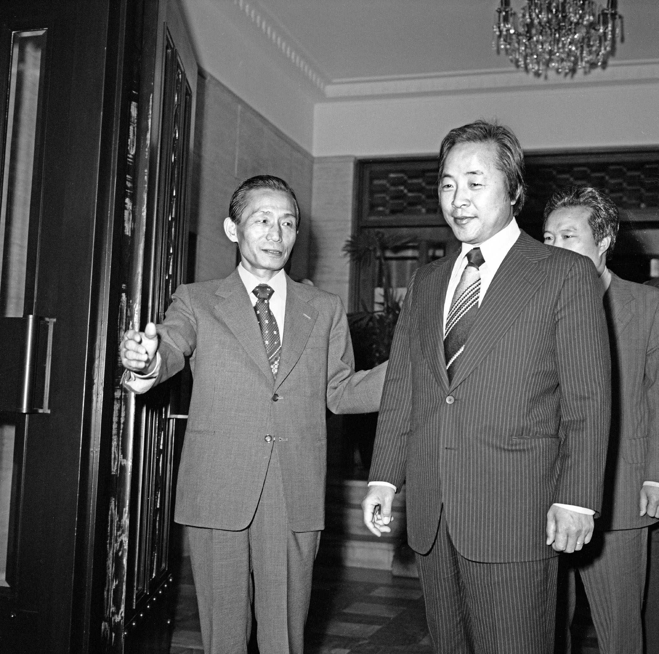 President Park Chung-hee (left) and future President Kim Young-sam (right) in 1975.