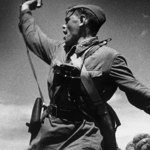 A Soviet junior political officer urges Soviet troops forward against German positions, 1942